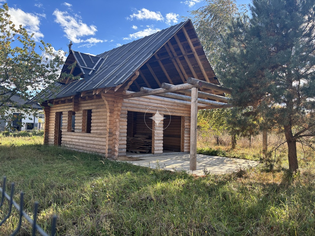 Dom drewniany, 70 m², stan surowy, 489 m² działka